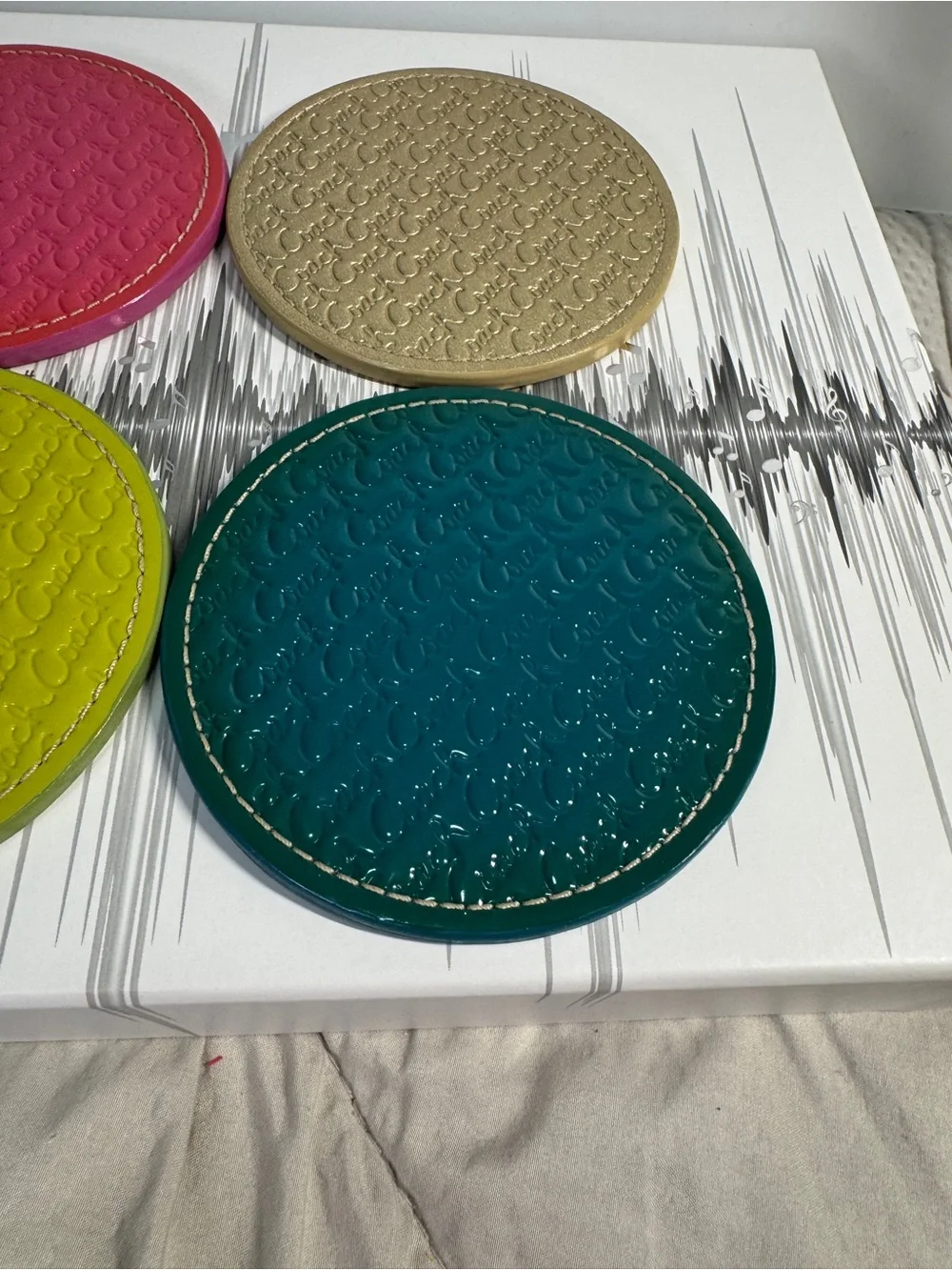 Coach rare set of 8 coasters